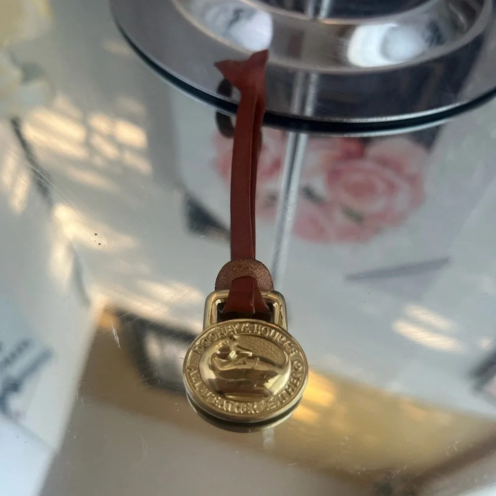 Dooney & Bourke  vintage Brown Leather Keychain with Gold Accent